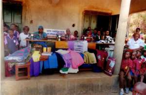 Bugiri Womens Group sewing uniforms for kids