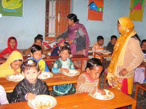 Rangpur preschoolers enjoying lunch