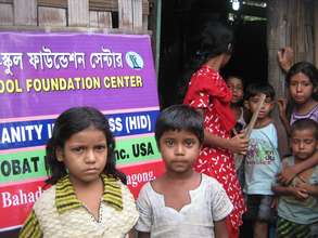 Students stand outside their class room