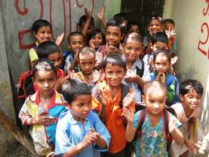 Children standing outside their preschool