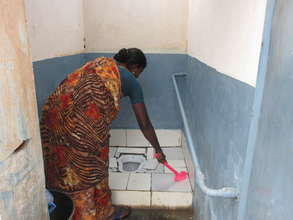 Sanitation worker at her job