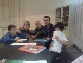 Students studying with our Program Coordinator Adi