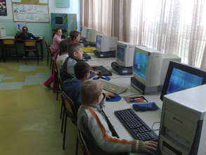 Students learning computer programs.