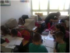 Beneficiaries working on homework