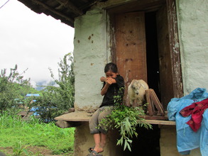 A girl with her family's goat