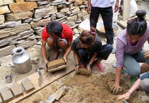 Making bricks to build an efficient cookstove!