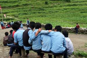 Boys outside the secondary school in Tipling