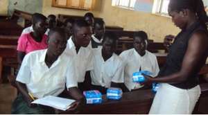 Bidati Primary school pupils receiving pads