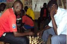 Youth relaxing as they play games