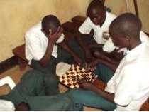 In-school youth playing indoor games at the center