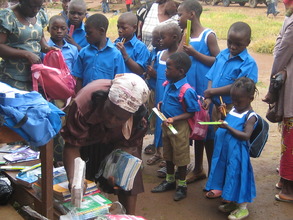 BERUDA's Mary distributing supplies