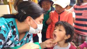 dentist checking L. s teeth