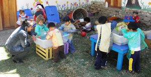 playing with water and sand