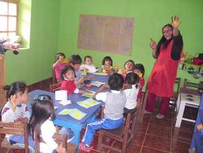 Our local teacher, Maribel with the littlest ones