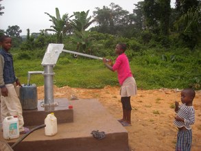 Another girl pumping for water