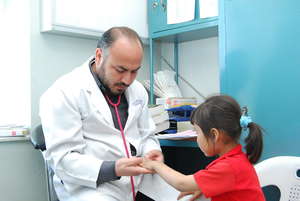 Pediatrician and Young Girl