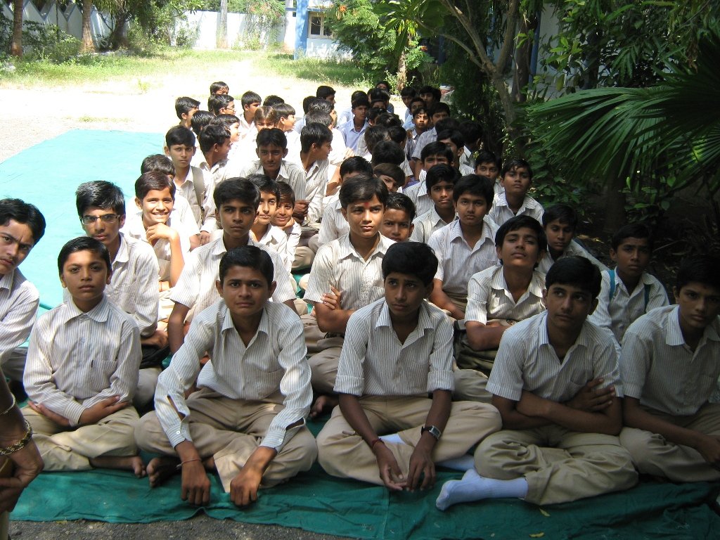Promote education of 100 disadvantaged children