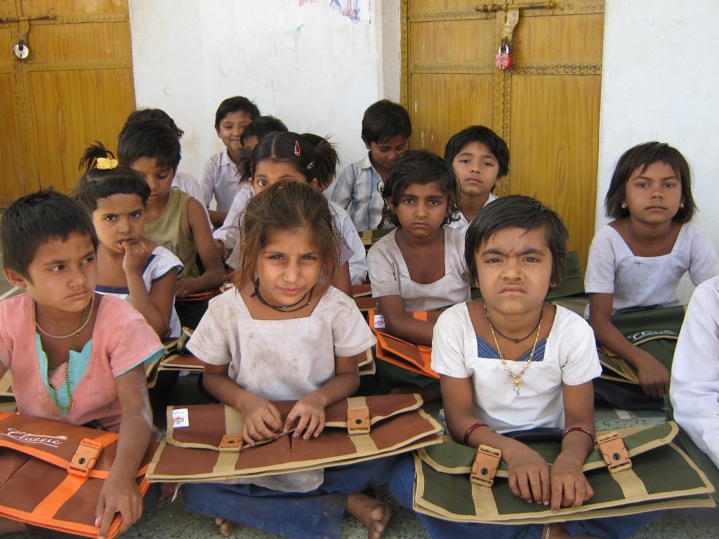 Promote education of 100 disadvantaged children