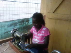 An ex-child slave in dressmaking training