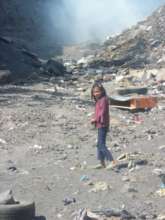 Carmen working in the dump