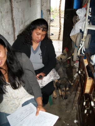 Marisol doing home visits 2012