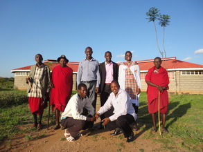 Isaac with librarians, library askari's and board