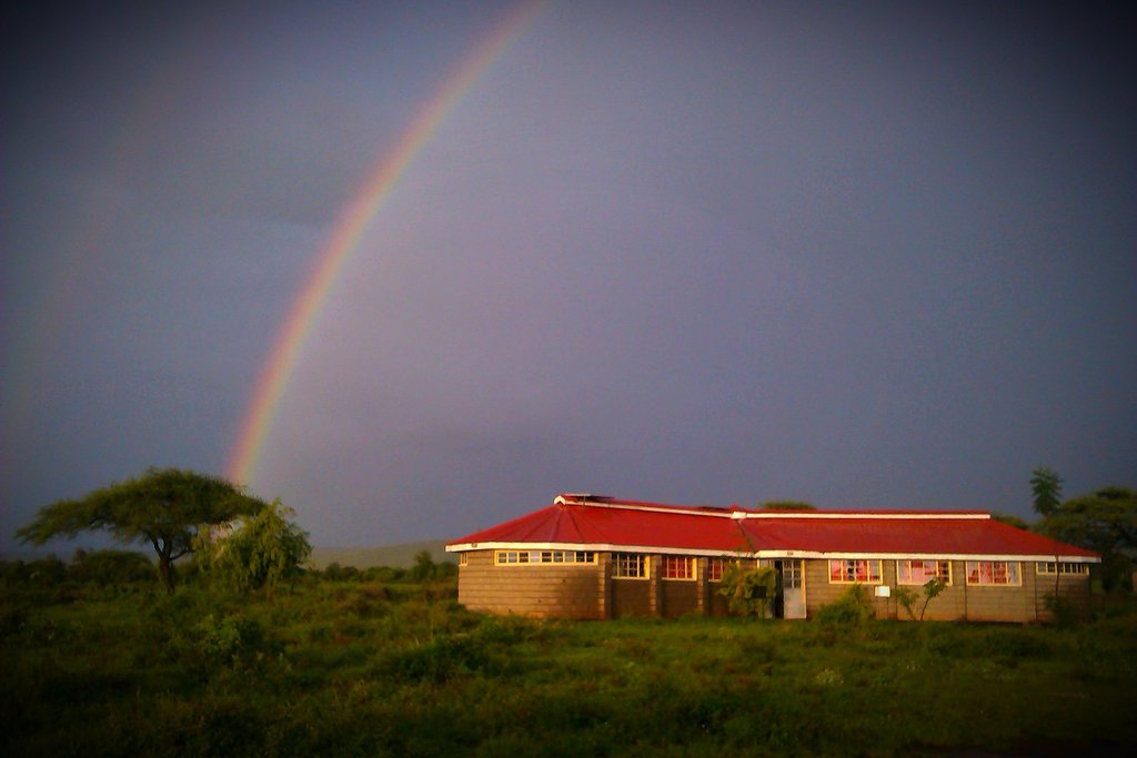 The Library under a rainy season rainbow