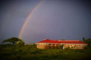 The Library under a rainy season rainbow