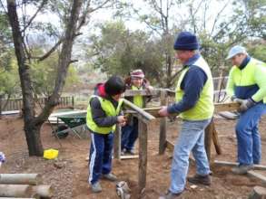 Volunteers assist with Pen Construction
