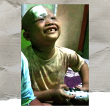 Happy with his Playstation