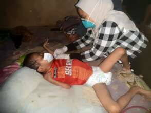 Little Rian with Rachel House Nurse