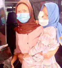 Lila with her loving mom