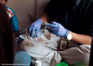Our nurse checks the patients' medications