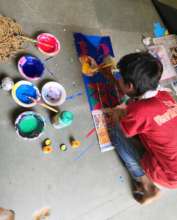 young artist busy for the exhibition