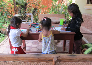 While the women learn, the children draw :)