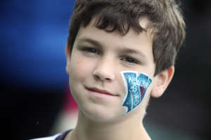 Boy at Birthday Party with face painted