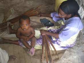 Woman working with her child