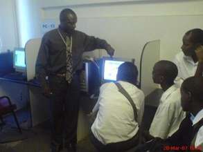 Tommie with his students