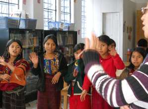 Singing the welcome song, led by librarian,Tereza.