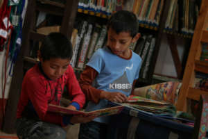 Two members reading at the library