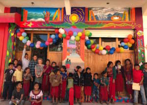 Children celebrating the mural's unveiling