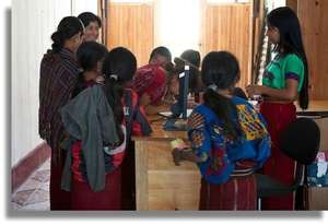 Our new librarian Marilu (far right).