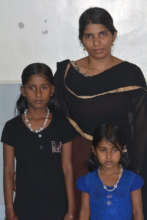 Ahalya and Avanthika with their mother.