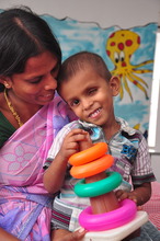 Santhosh and his mother at Aravind Eye Hospital.
