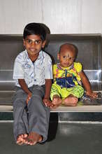 Rithikisari and her big brother say thanks!