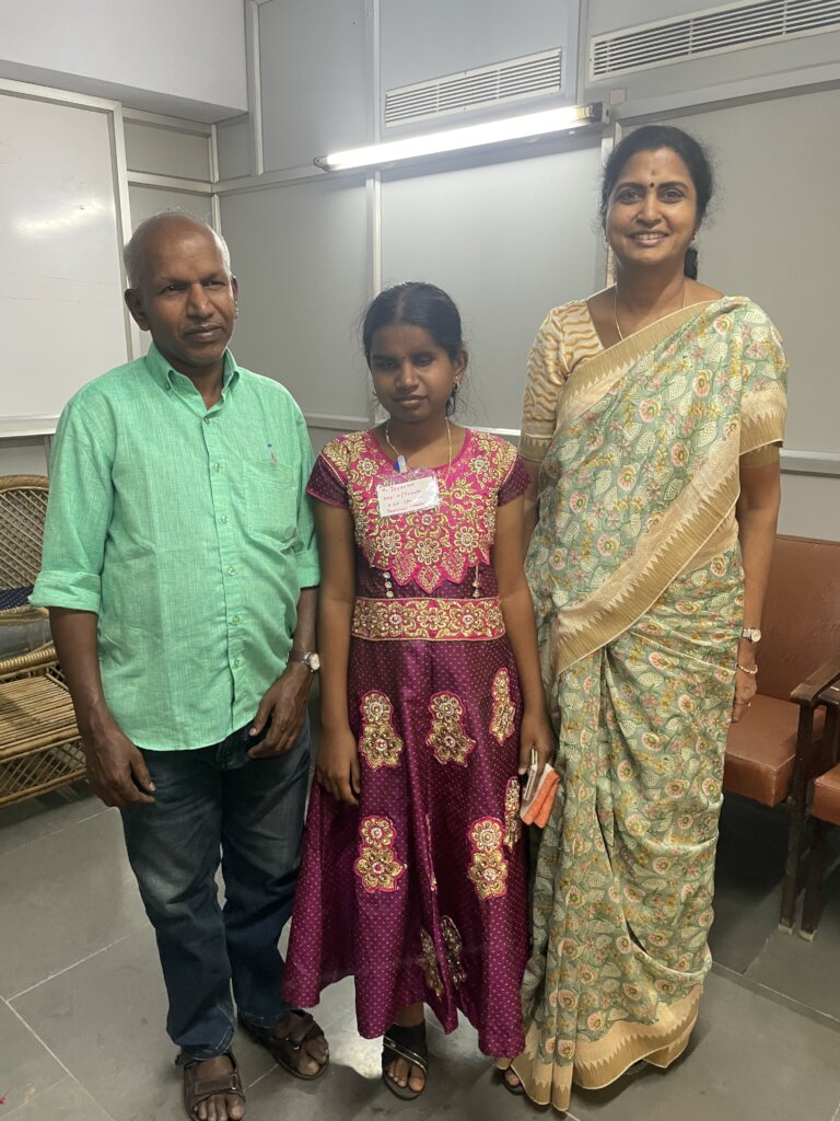 Cancer survivor Jeyanthi, her father, and Dr. Usha
