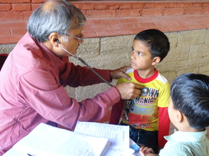 Dr Nalin Pandey (Paediatrician) with school kids