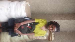 Faridah and her old school back pack