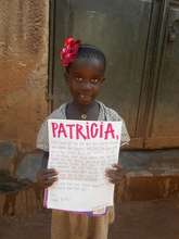 Patricia and her gift from her sponsor