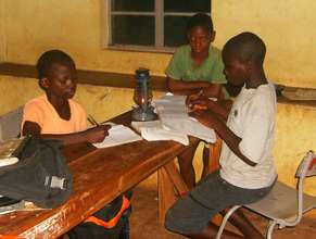Studying with a kerosene lantern